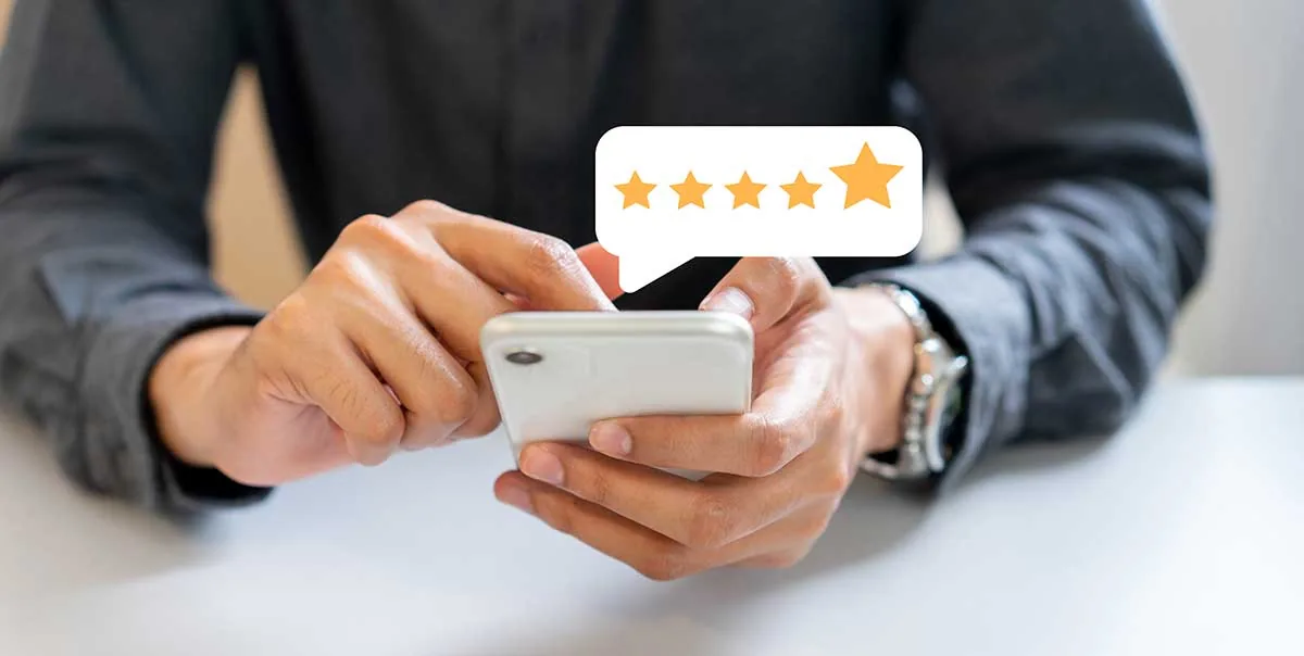 Top 10 Ways to Improve Your Local SEO Right Now image Get reviews from customers such as this man giving five-star rating.