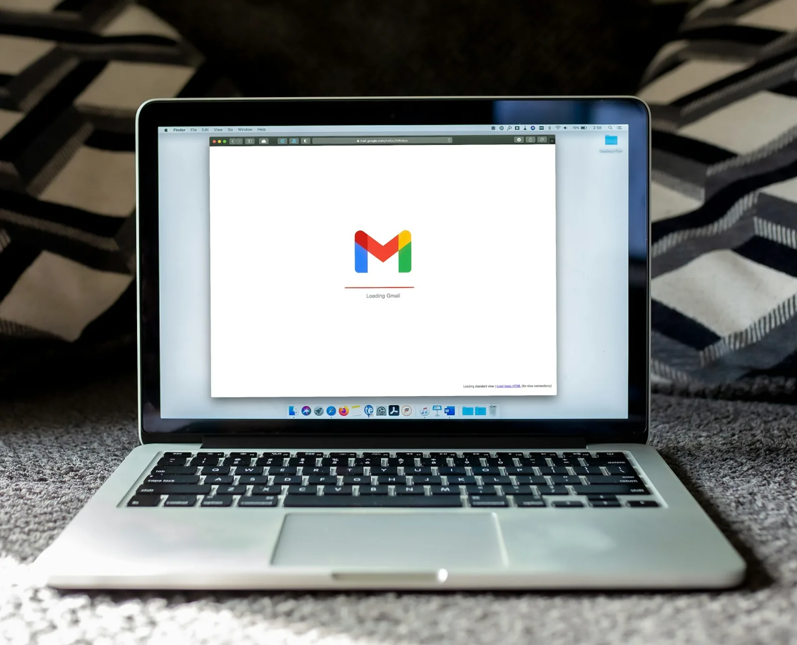 A Business Owner's Guide to Creating Seamless Customer image macbook pro on black textile